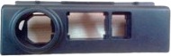 A dark blue-grey rectangular bezel with one round and two square openings.